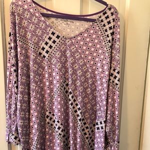 Purple/white patterned blouse.